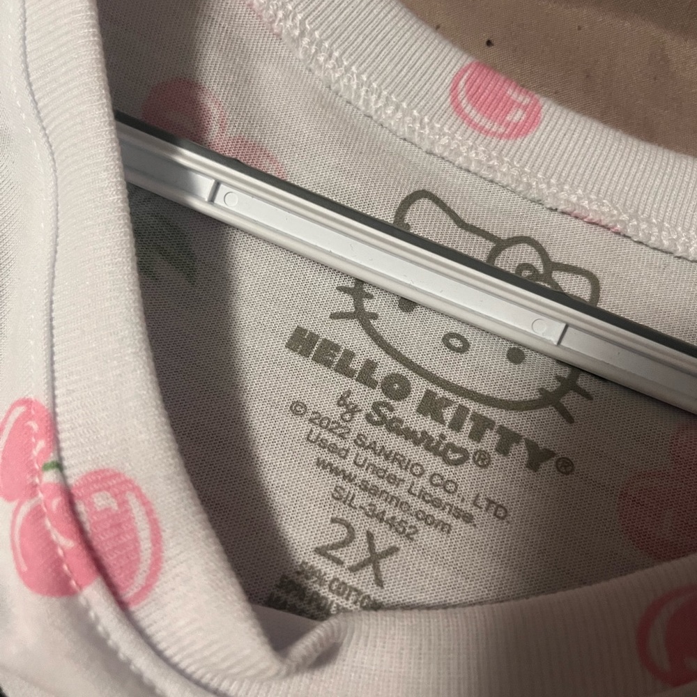Hello kitty shirt that is white with cherries 🍒